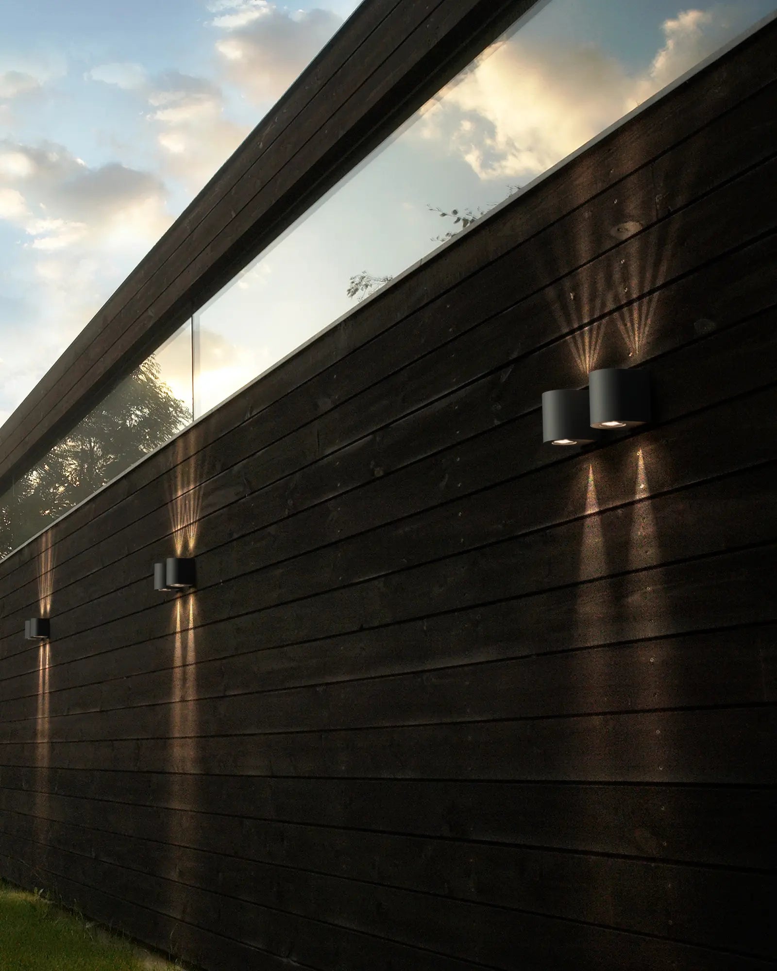 Canto 2 small minimal Scandinavian up and down light on cladded exterior wall