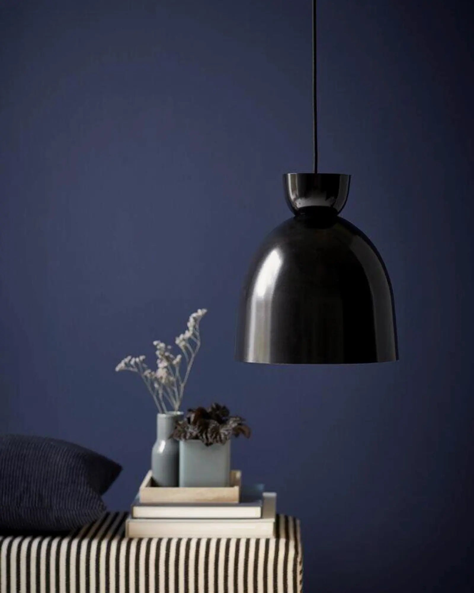 Circus contemporary Scandinavian pendant above a sofa black