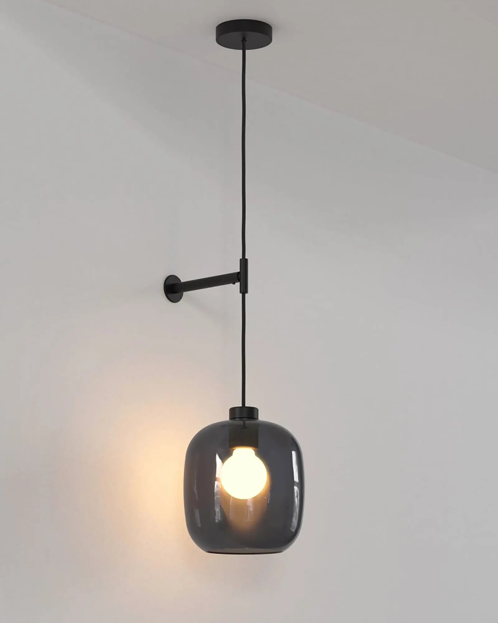 Curve contemporary pendant light with wall mount and smoke blown glass shade black small