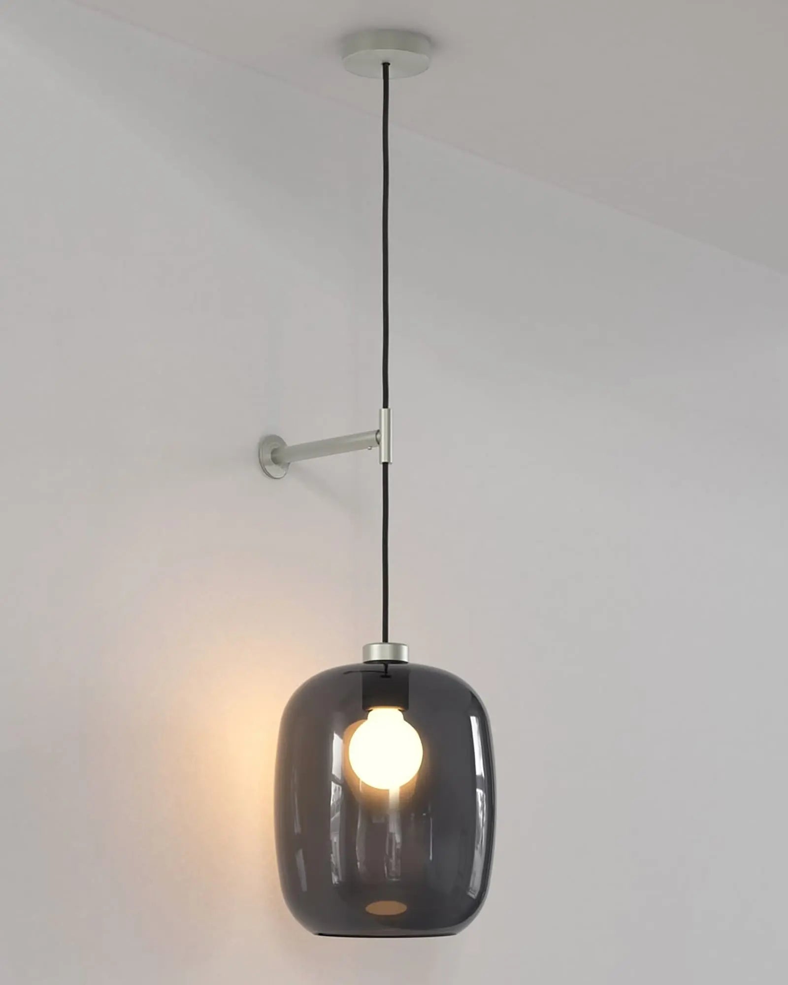 Curve contemporary pendant light with wall mount and smoke blown glass shade nickel large