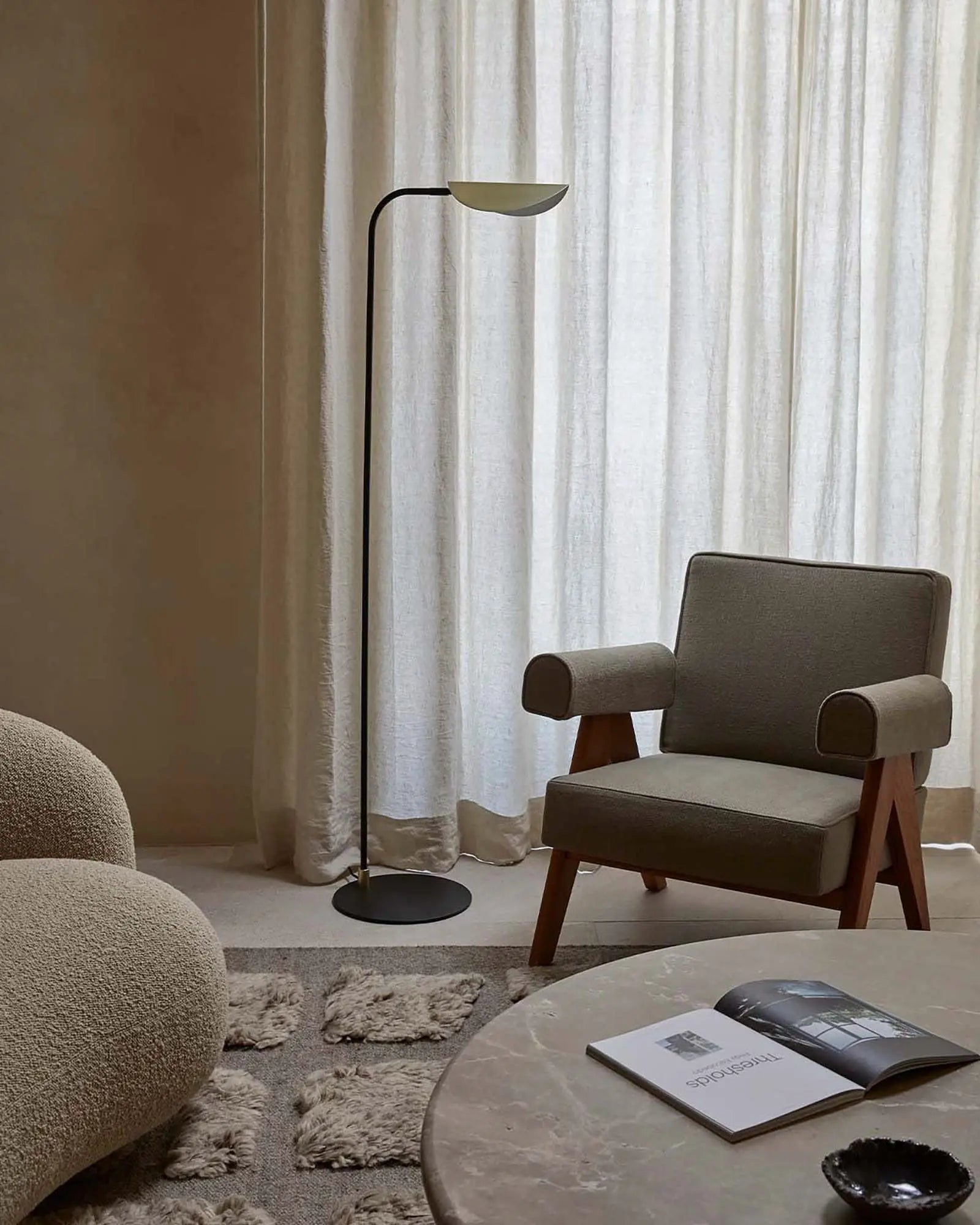 Ficus Floor lamp contemporary minimalistic brass shade in a loungeroom