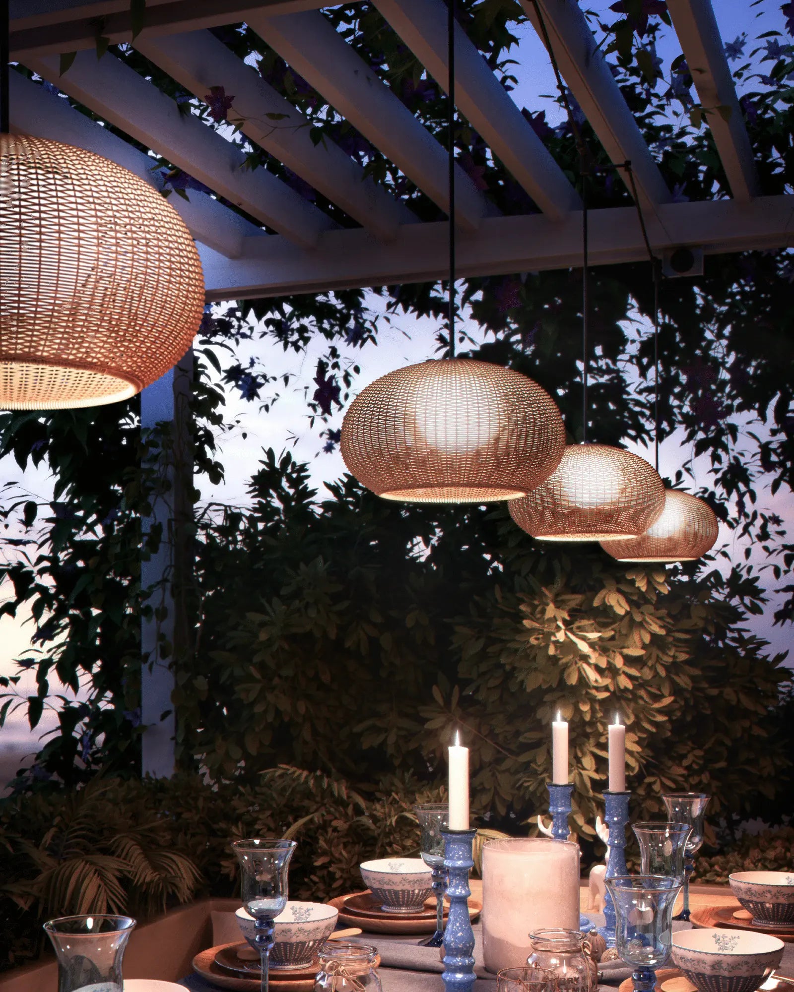Garota woven contemporary coastal pendant light cluster on outdoor dining table