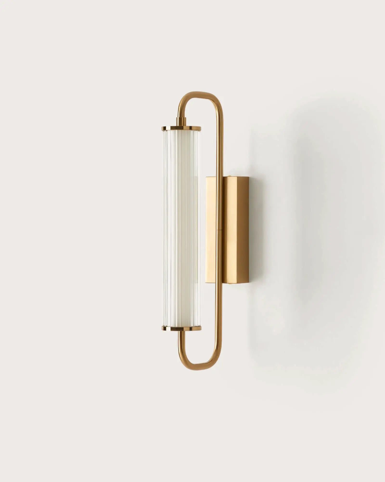 Ison wall light with ribbed glass shade brass