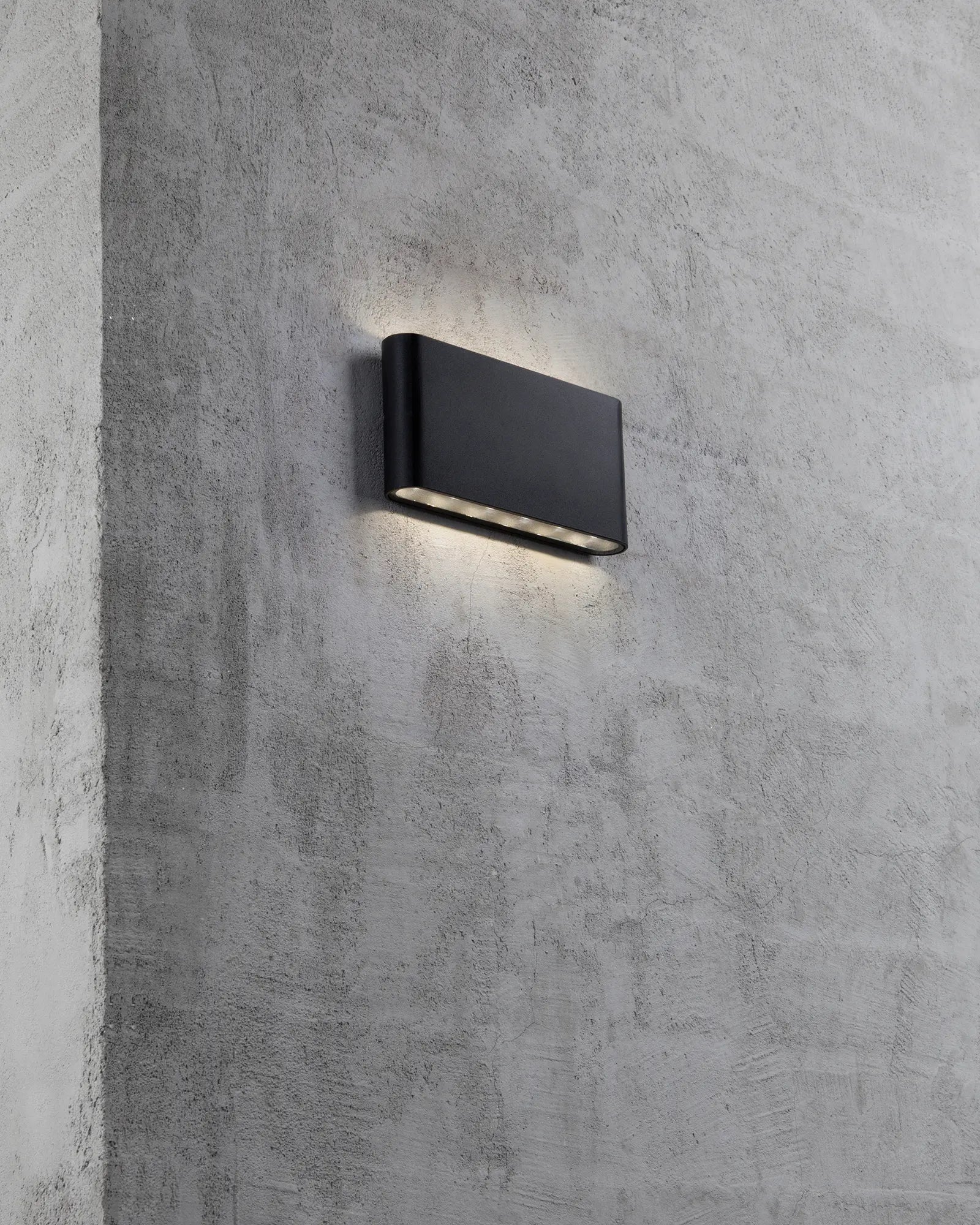 Kinver minimal Scandinavian outdoor wall light black on concrete wall