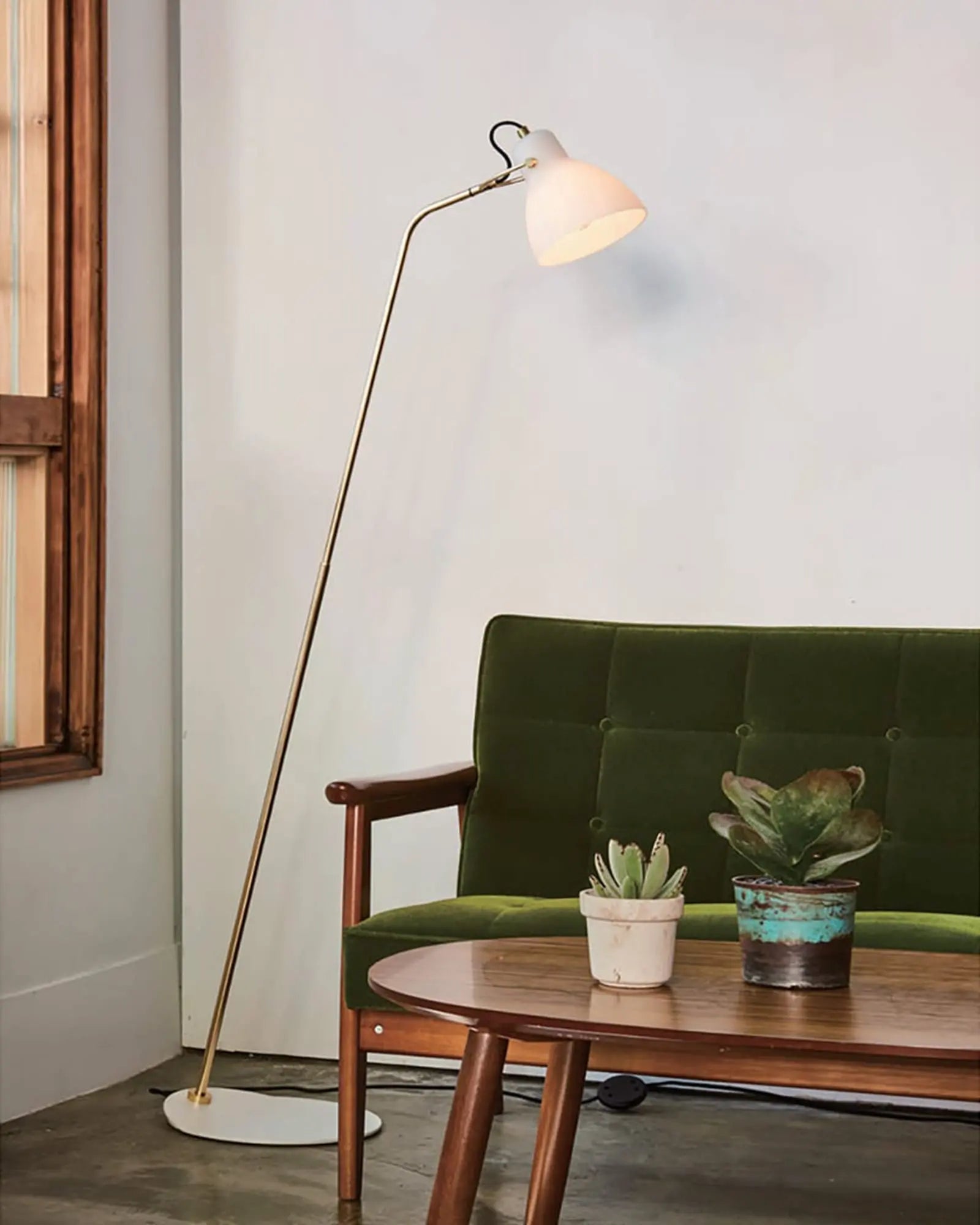 Laito floor lamp above a sofa