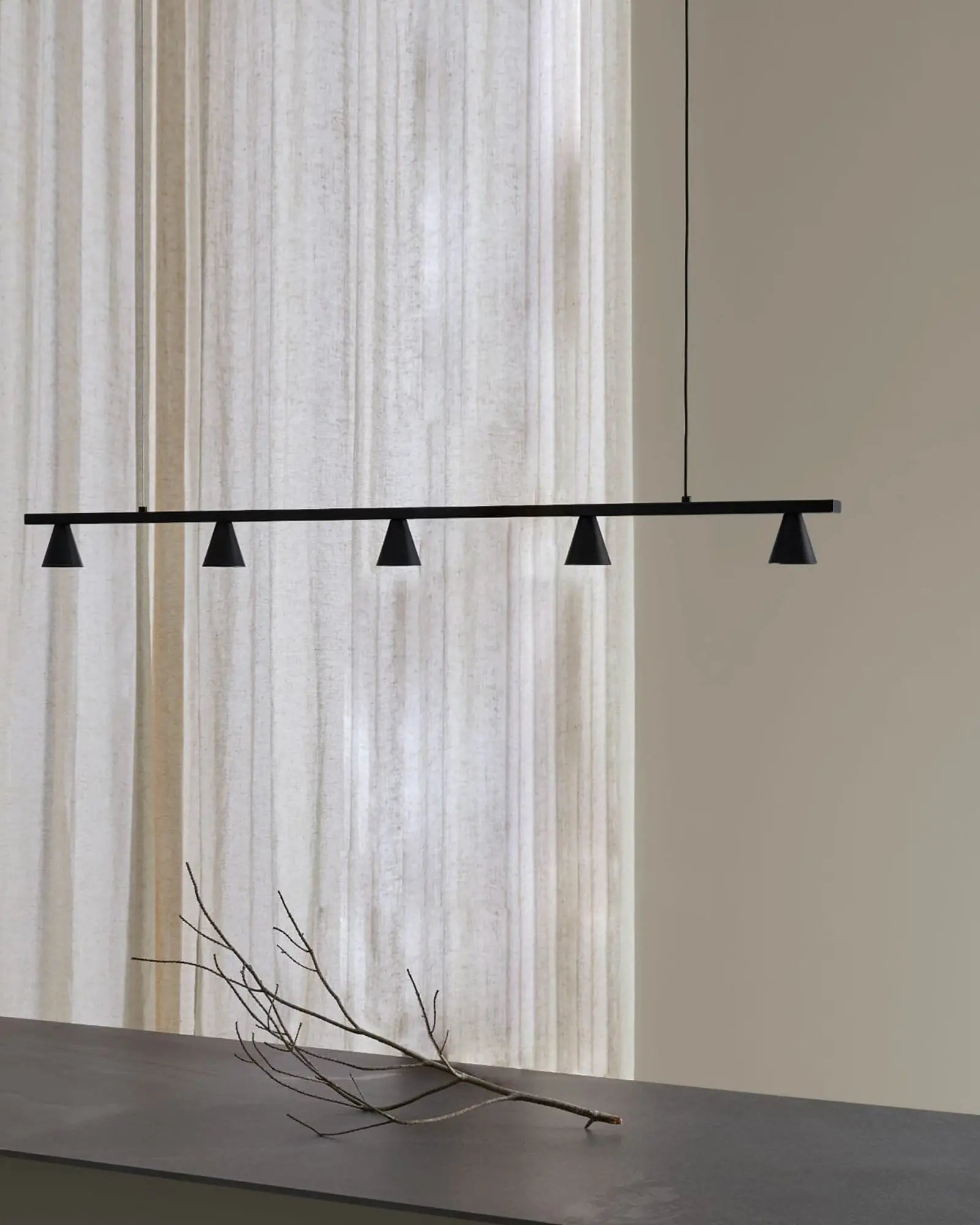Lyb linear contemporary 5 lights pendant light with conic shades on a dining table