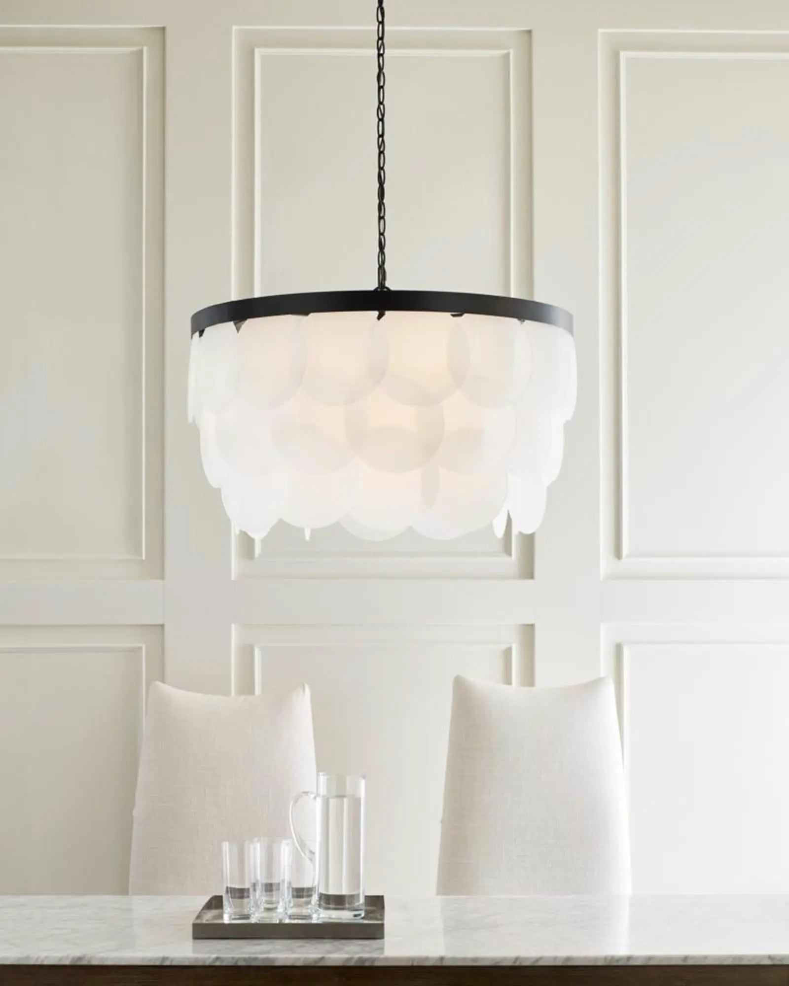 Mellita Traditional pendant light above a marble table
