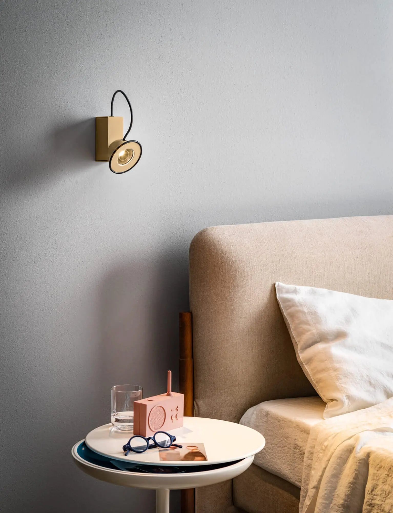Minibox wall light in a bedroom