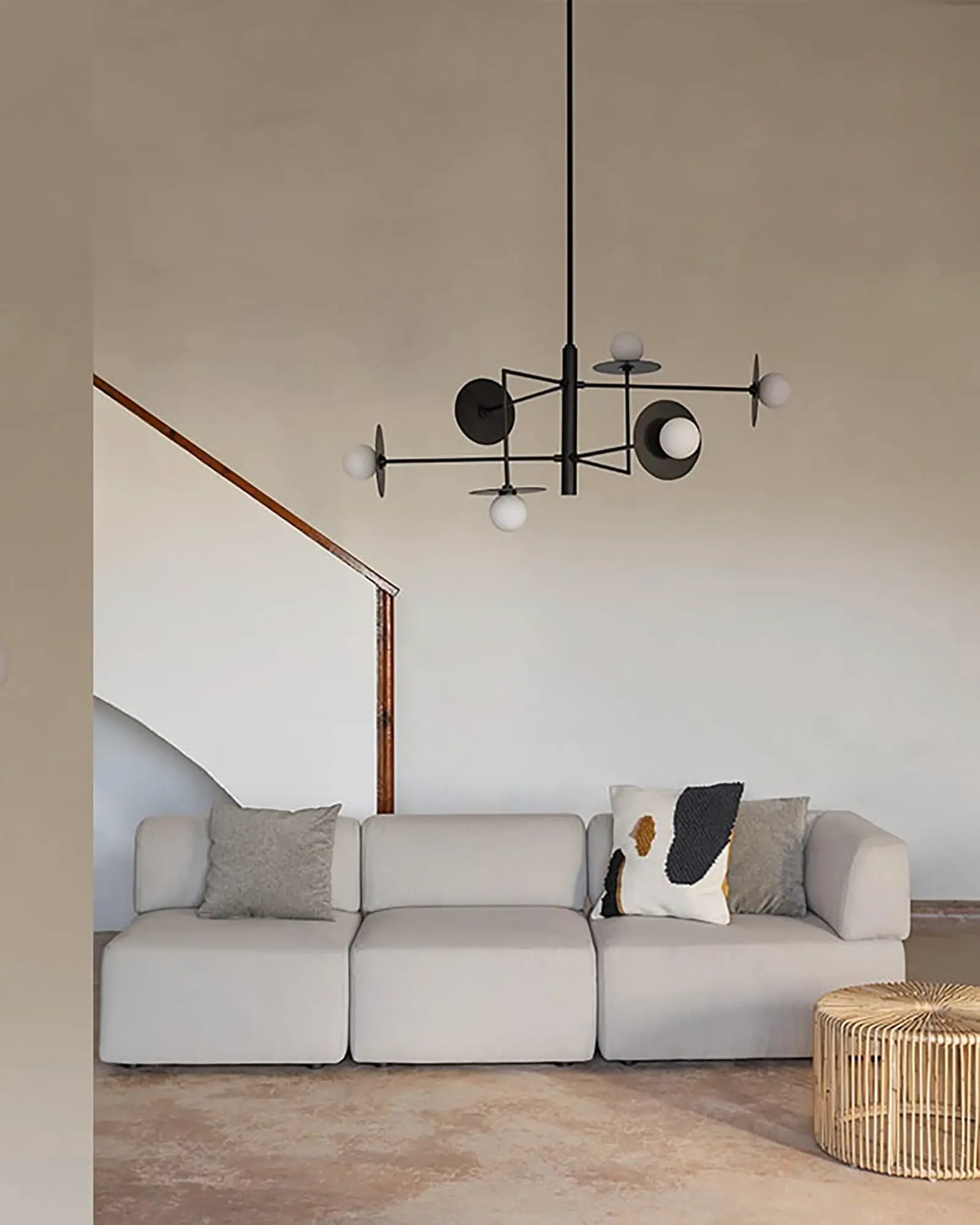 Miro 6 Lights opal orb shades and metal disc geometric contemporary pendant light above a sofa