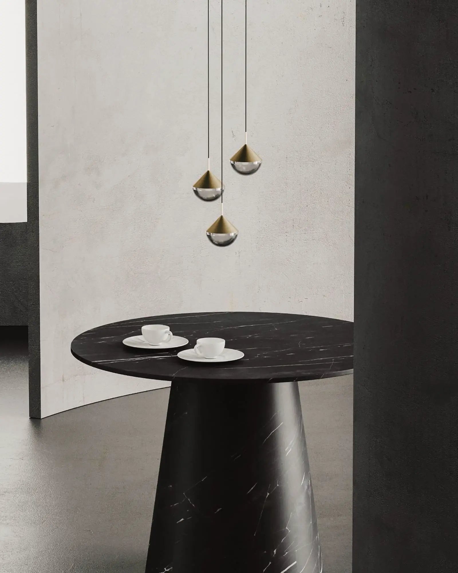 Nino contemporary pendant light cluster above a round marble table