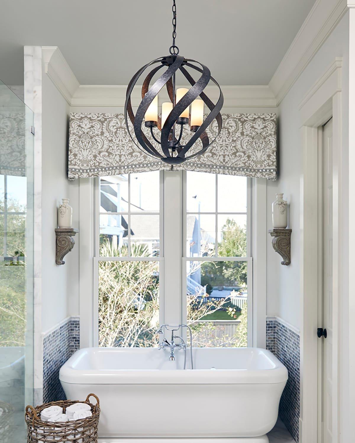 Blacksmith outdoor traditional pendant above a bathtub in a bathroom on Nook Collections