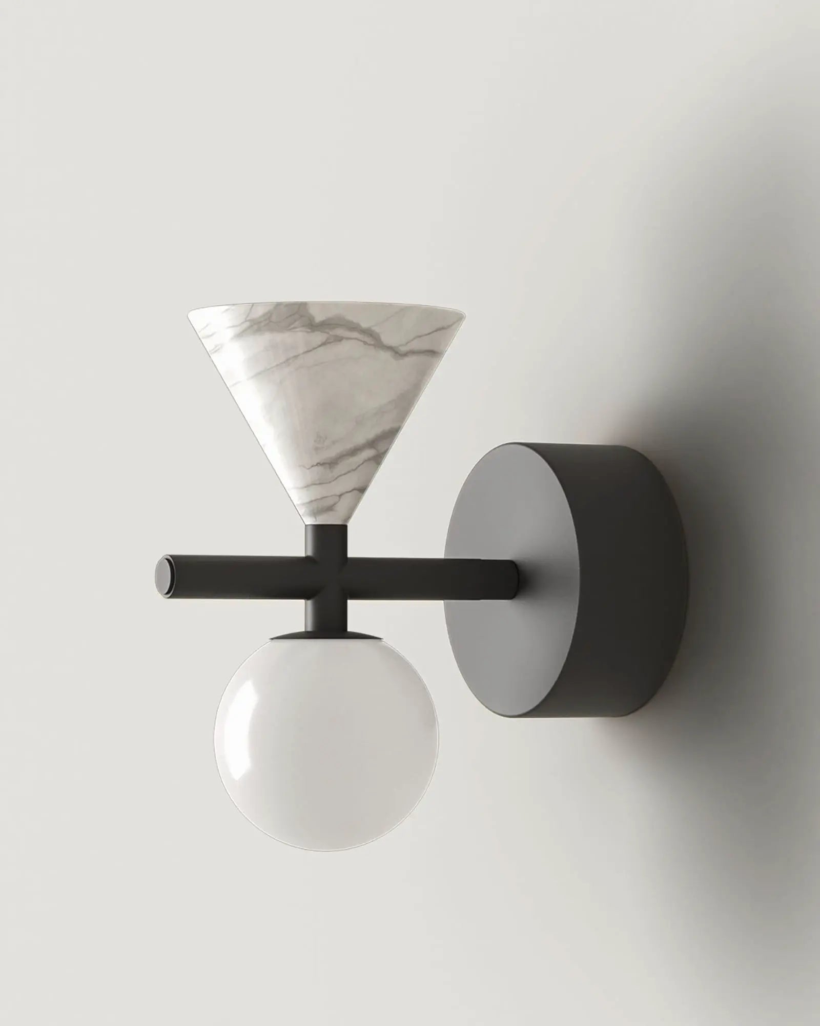 Oneta contemporary wall light with opal glass orb shade and marble cone in black and white