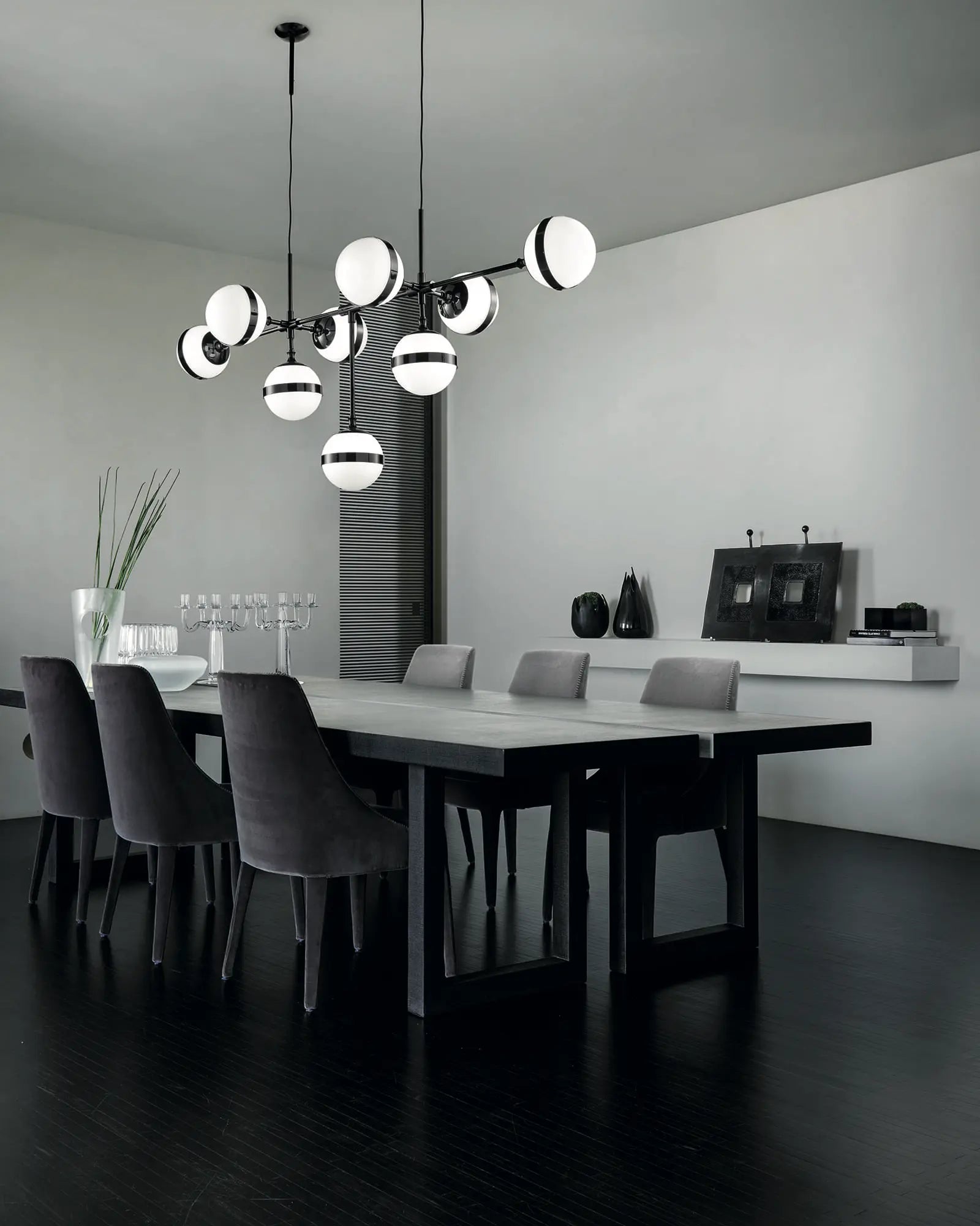 Peggy 9 orbs shade contemporary pendant over a dining table