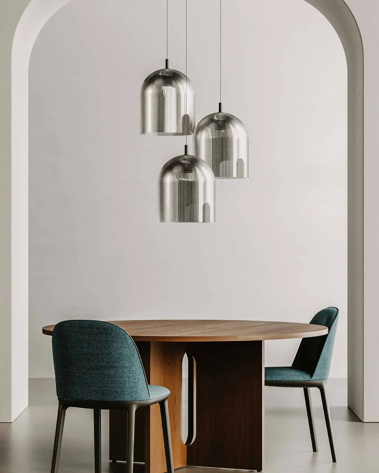 Porta ribbed glass contemporary bell shade pendant cluster above a round dining table