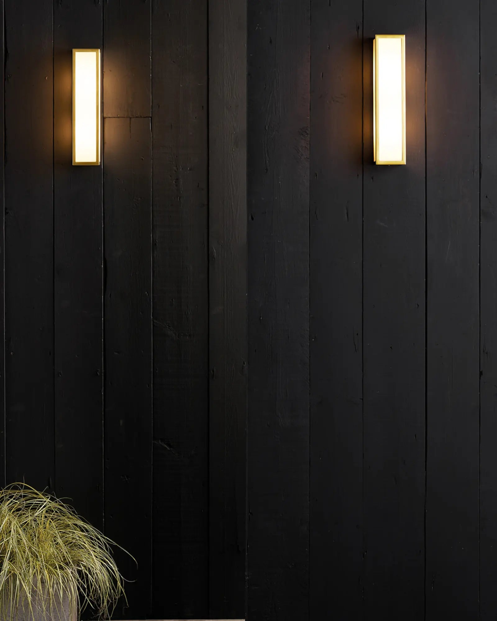 Salerno metal and opal glass rectangular contemporary wall light on a cladded wall outdoor