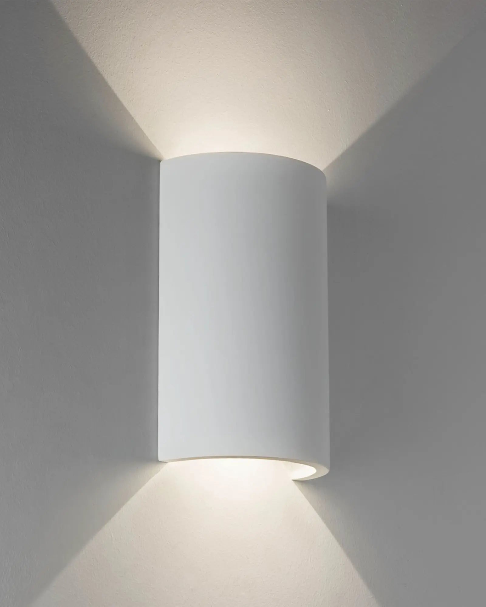 Serifos contemporary plaster curved wall light