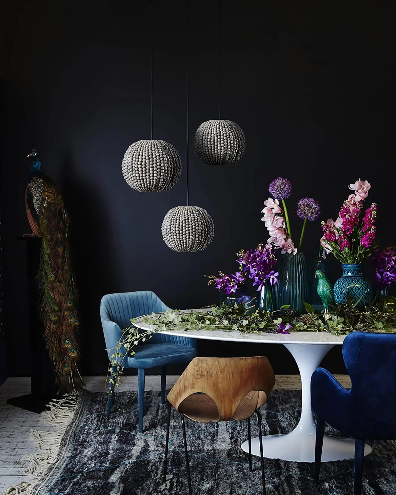 Sphere pendant light above dining table