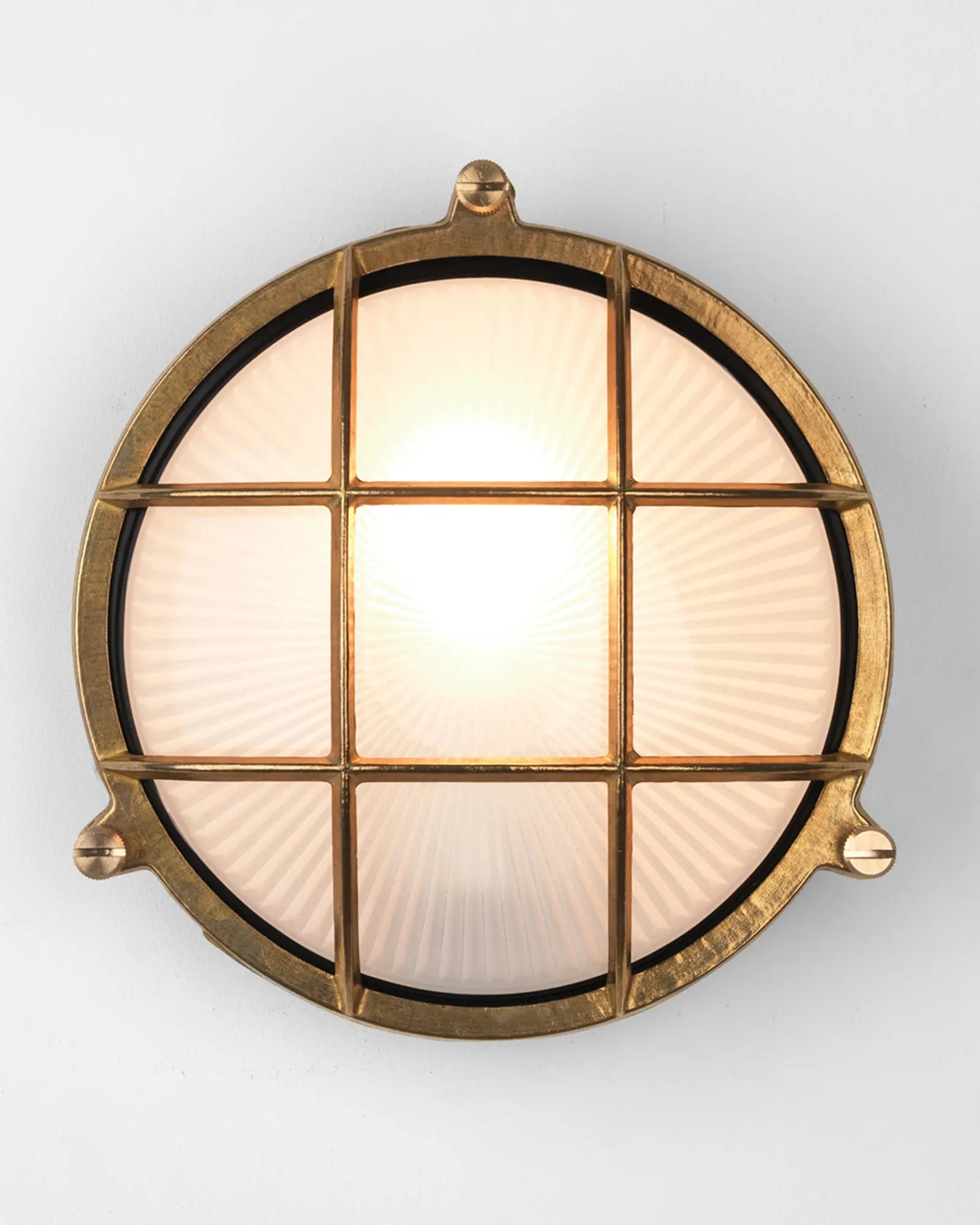Thurso round brass and glass classic wall light