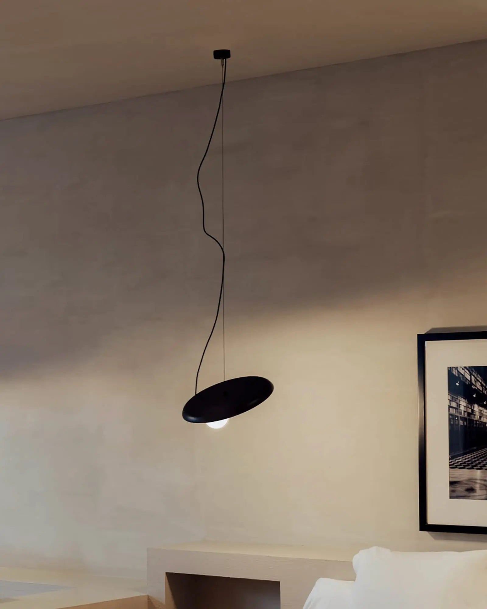 Wire pendant light in a living area